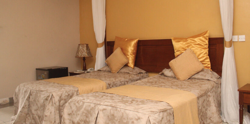 Image showing the arrangement of a room having twin beds at Mombasa Sports Club.
